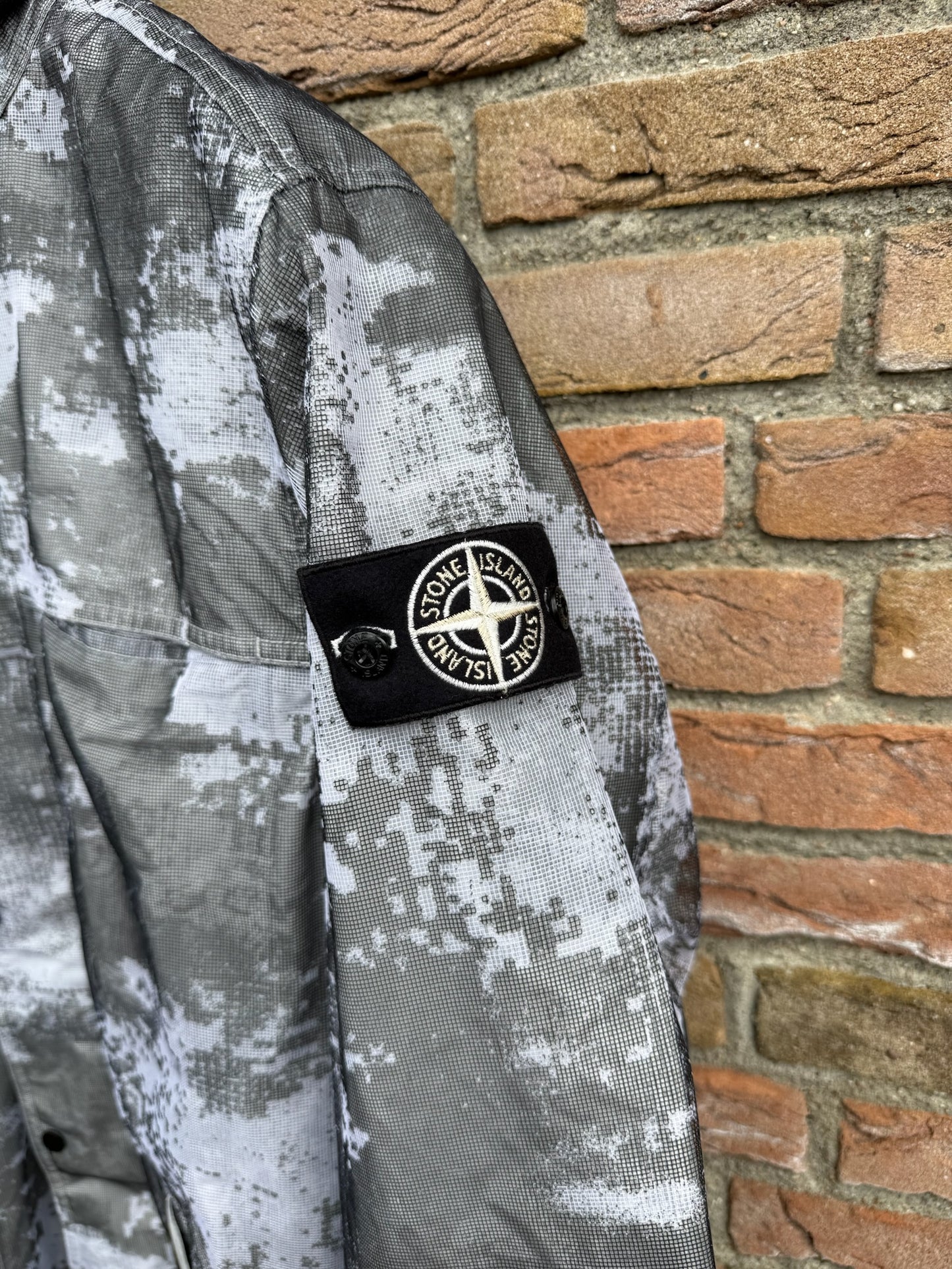 Stone Island Dissolving Grid Camo Mesh on Reflective Nylon Jacket - M
