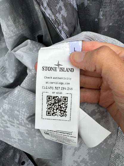 Stone Island Dissolving Grid Camo Mesh on Reflective Parka - L